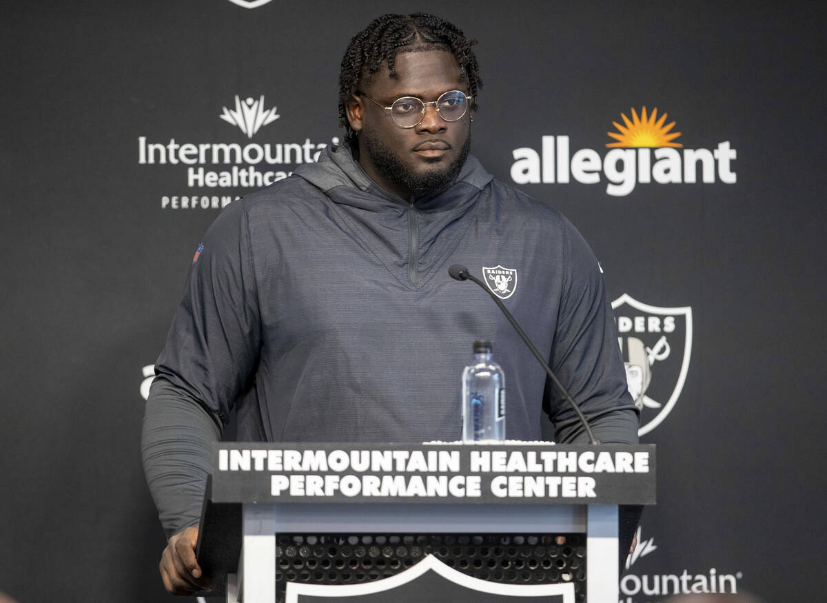 Raiders offensive lineman Alex Leatherwood attends a news conference after the team’s tr ...