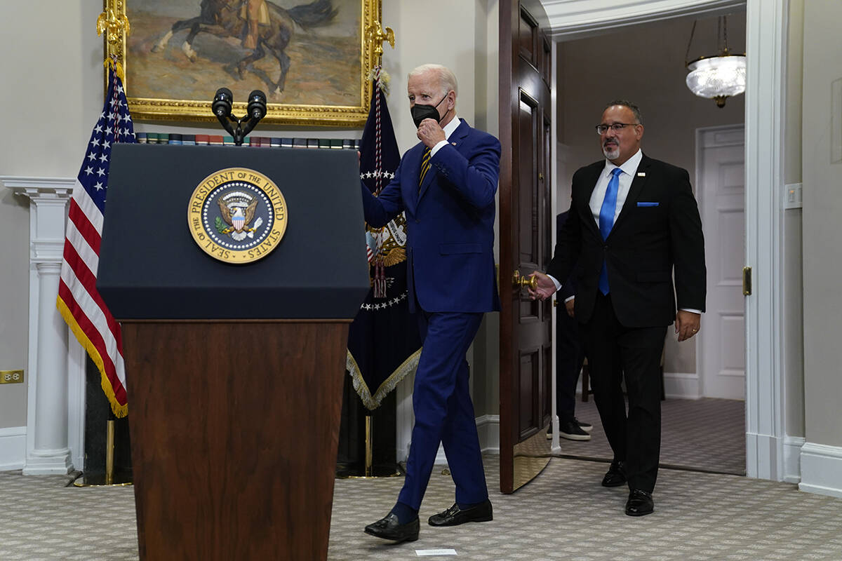 President Joe Biden arrives with Education Secretary Miguel Cardona to speak about student loan ...