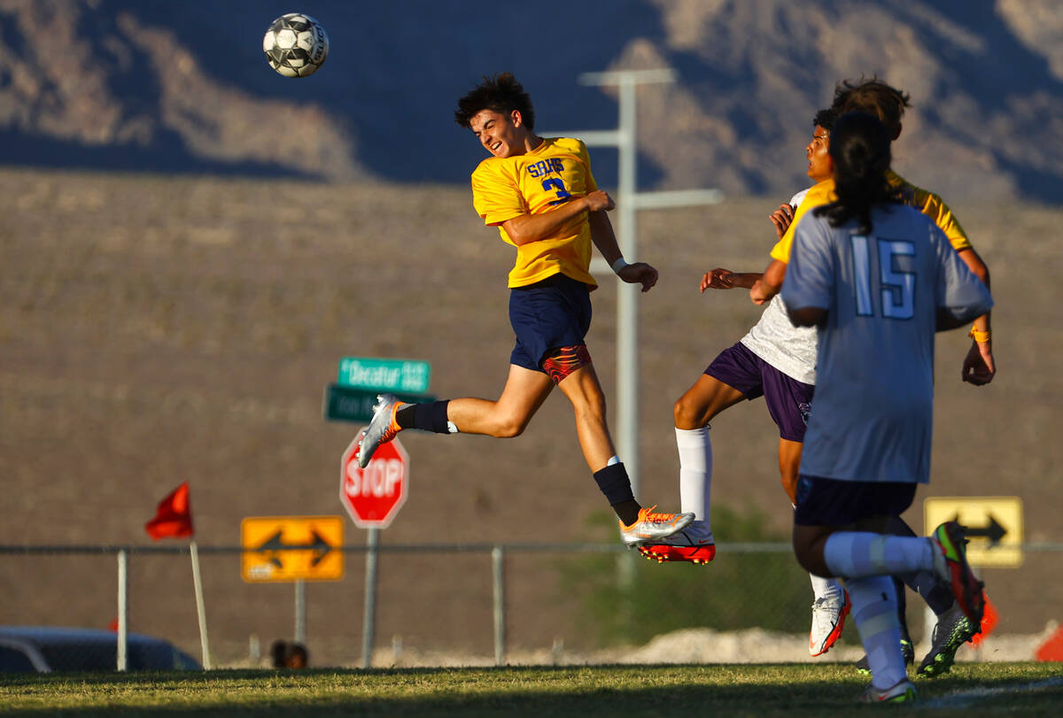 Shadow Ridge’s Nicolas Smyth (3) heads the ball against Silverado during a soccer game a ...