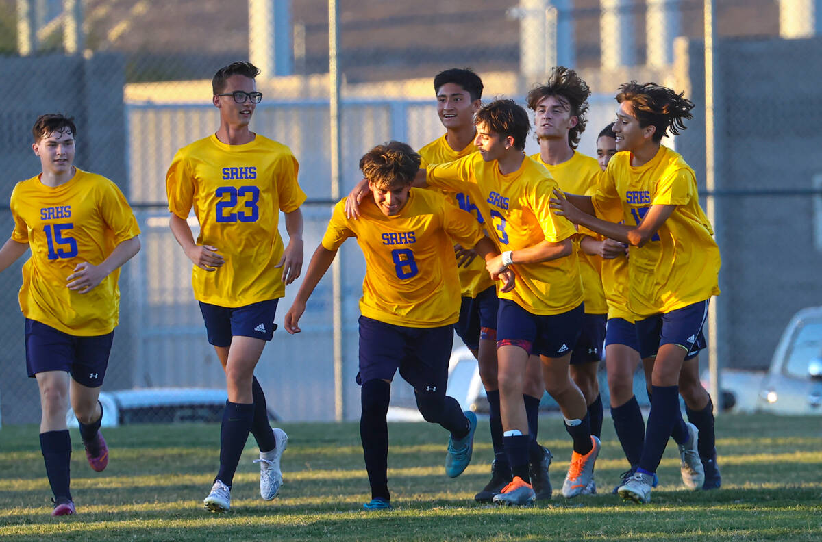 Shadow Ridge players celebrate a goal against Silverado during a soccer game at Shadow Ridge Hi ...
