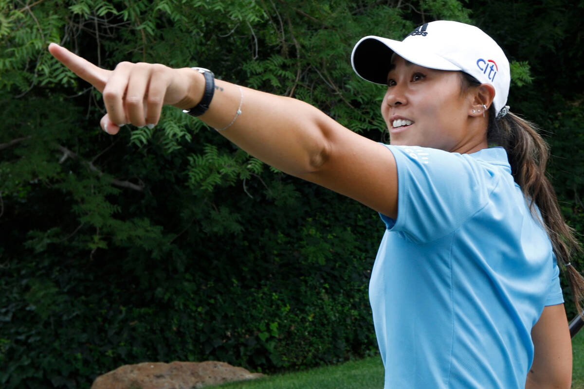 Danielle Kang gestures after finishing the 18th hole during the fourth round of the Bank of Hop ...
