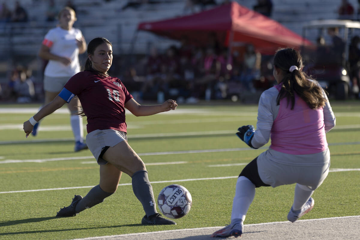 Cimarron-Memorial forward Melinda Bravo-Avendano (10) kicks to score a goal against Bonanza goa ...