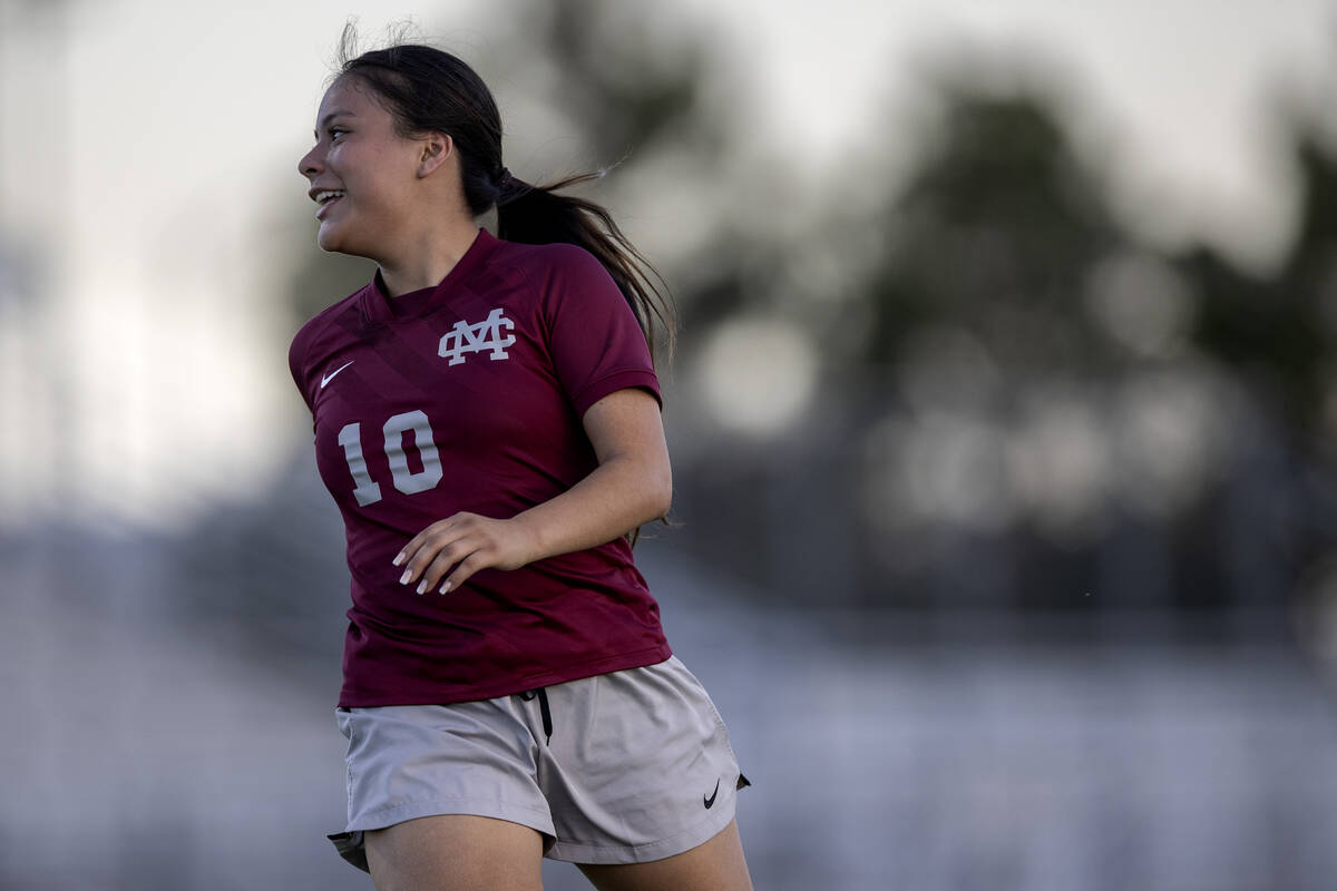 Cimarron-Memorial forward Melinda Bravo-Avendano (10) turns to celebrate with her team after wi ...