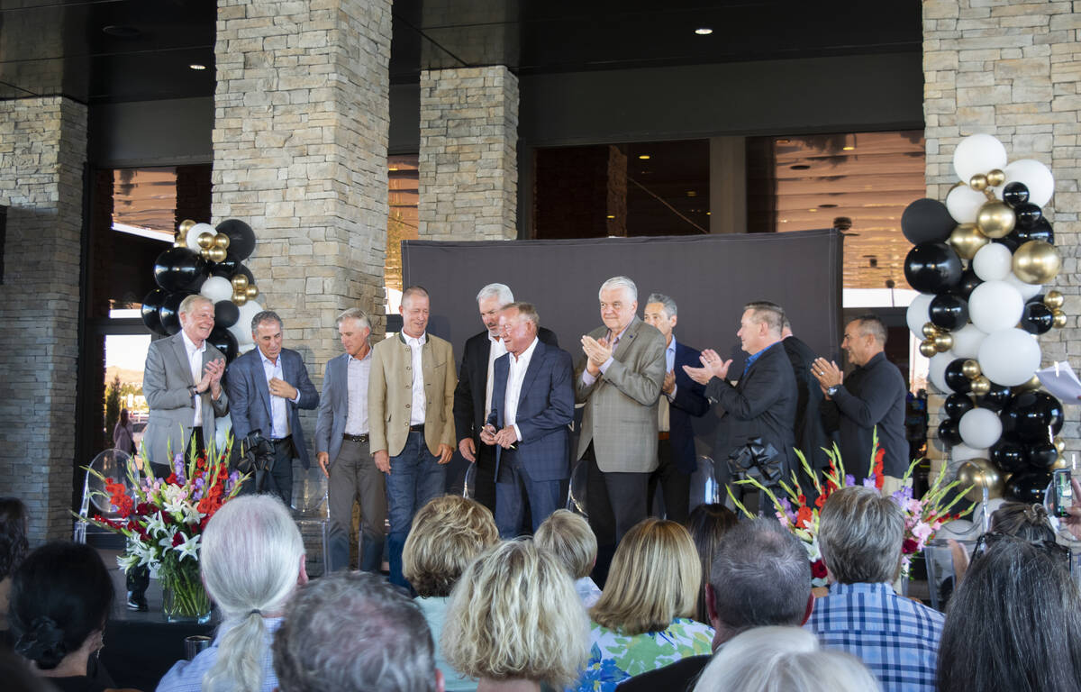 Gov. Steve Sisolak, third from right, celebrates the opening of Legends Bay Casino on Tuesday, ...