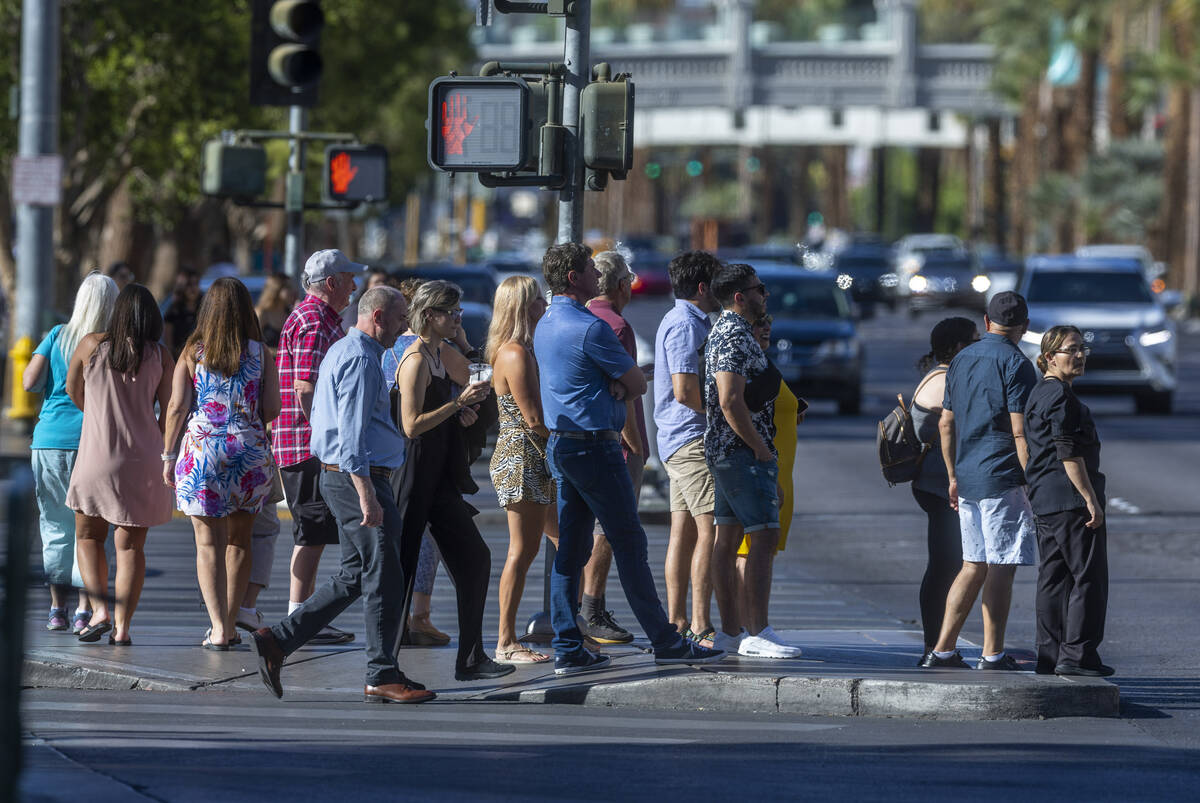 Visitors take to the Las Vegas Strip as Labor Day weekend approaches on Wednesday, Aug. 31, 202 ...
