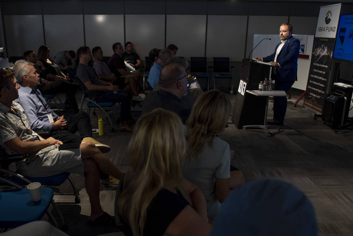 Nevada Treasurer Zach Conine speaks at a press conference to announce a new program that will p ...