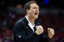 UNLV Rebels head coach Kevin Kruger shouts from the sidelines after UNLV Rebels forward Royce H ...