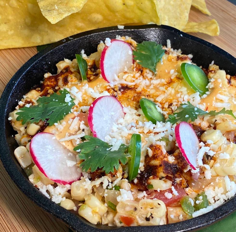 Image Cutline: Street Corn Dip with Chips ditampilkan selama bulan taco dan tequila di…