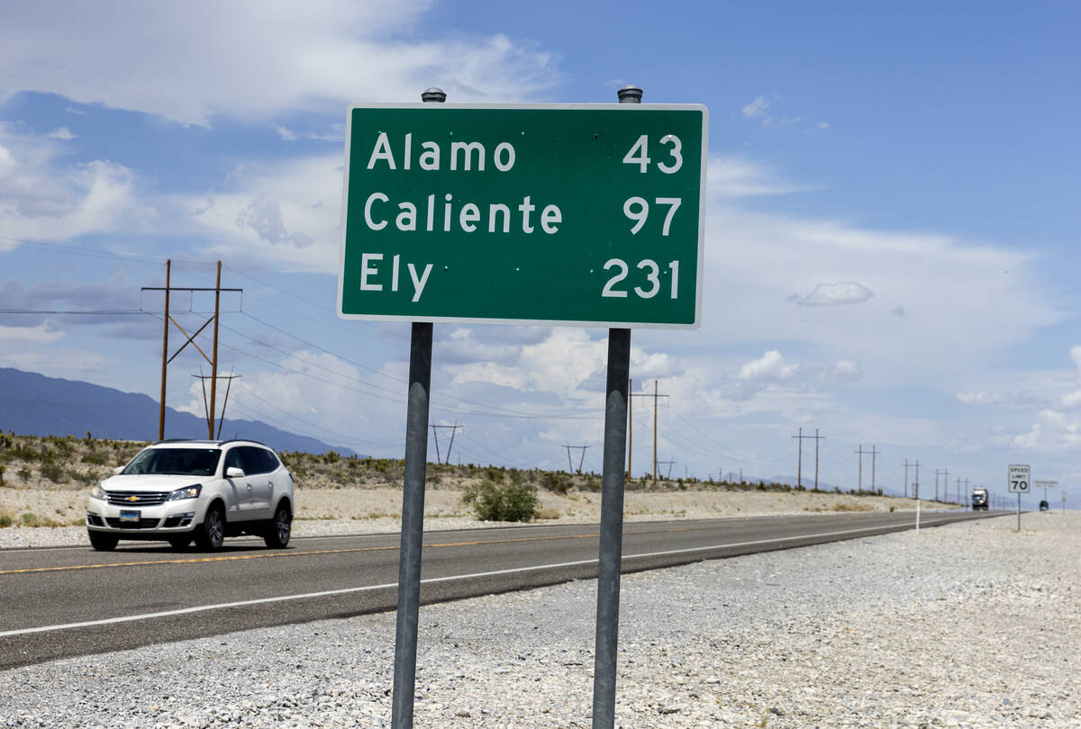 A highway distance sign is posted near Coyote Springs golf course on Wednesday, Aug. 10, 2022, ...