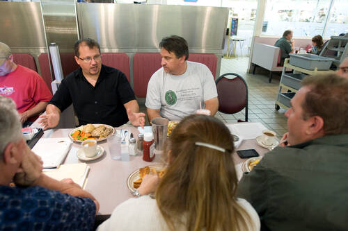 Stewart Rhodes, founder and spokesman of the Oath Keepers, second from left, talks during an me ...
