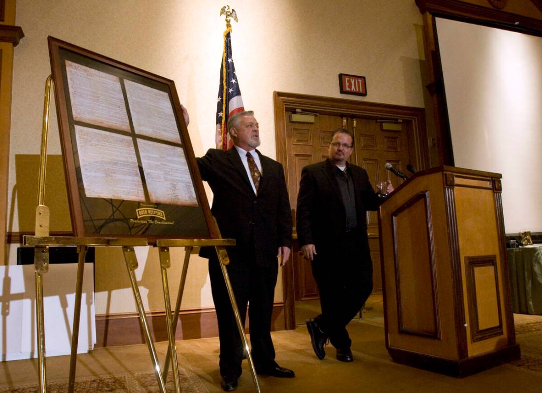 Oath Keepers National President Stewart Rhodes, right, and Executive Vice President Dave Freema ...