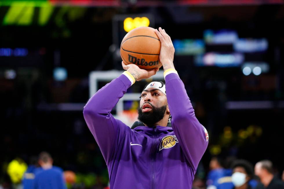 Los Angeles Lakers forward Anthony Davis (3) warms up before a preseason NBA basketball game ag ...