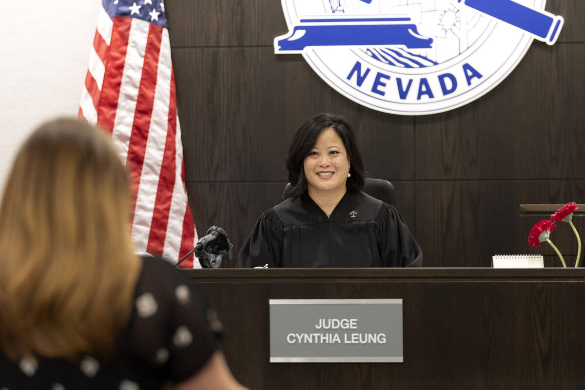 Judge Cynthia Leung smiles as she seals the City of Las Vegas court record of WIN Court graduat ...