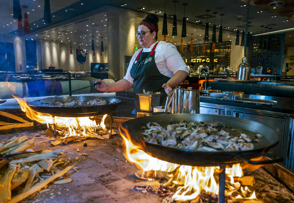 Chef Stephanie Sandfrey prepares paella over an open flame at Jaleo in The Cosmopolitan on Tues ...