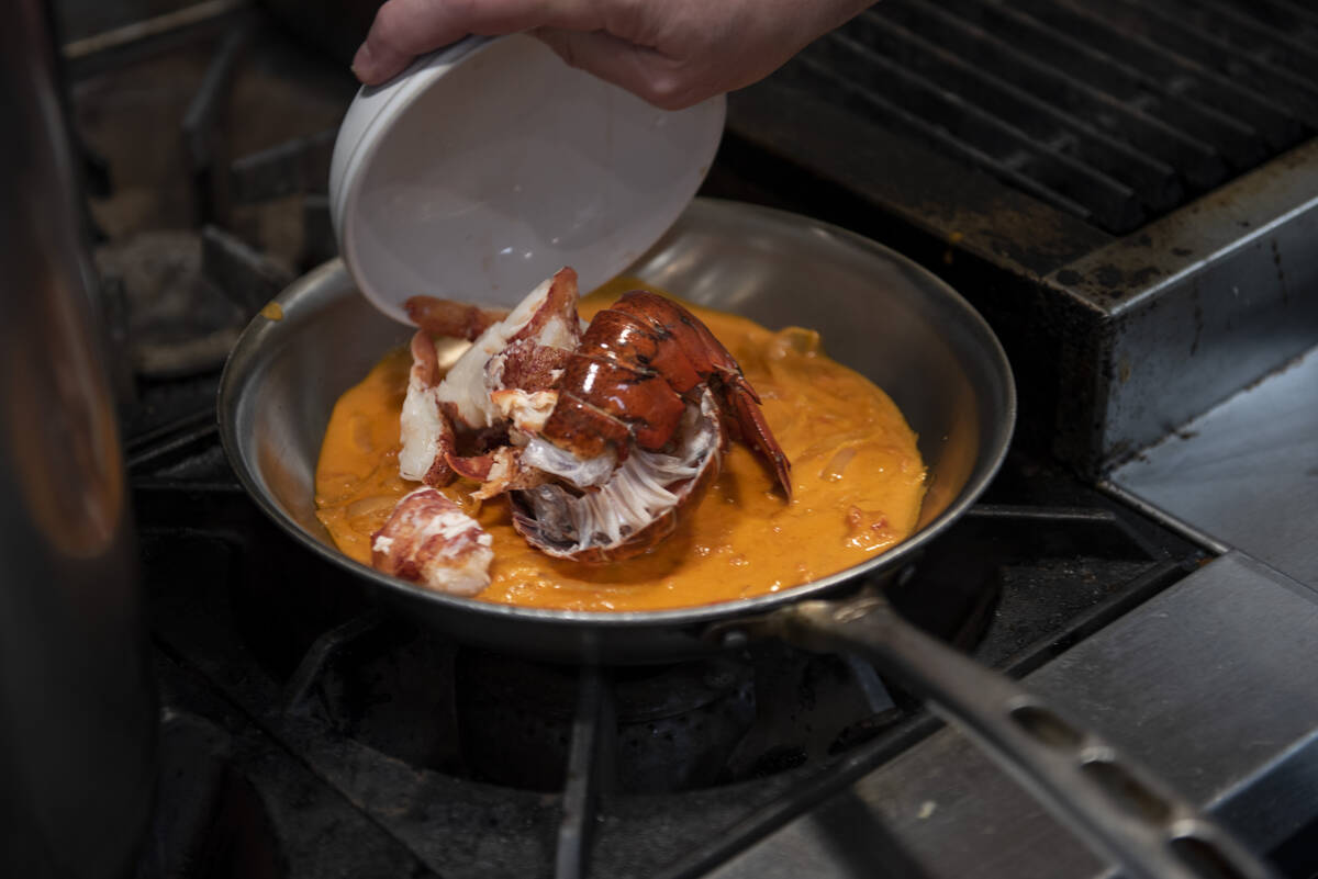 Robert Moore, chef and owner of Rosa Ristorante, prepares the restaurant's Rigatoni Alla Vodka ...