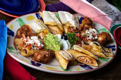 A combination platter is one of the happy hour specials being served at Pancho's Mexican Restau ...