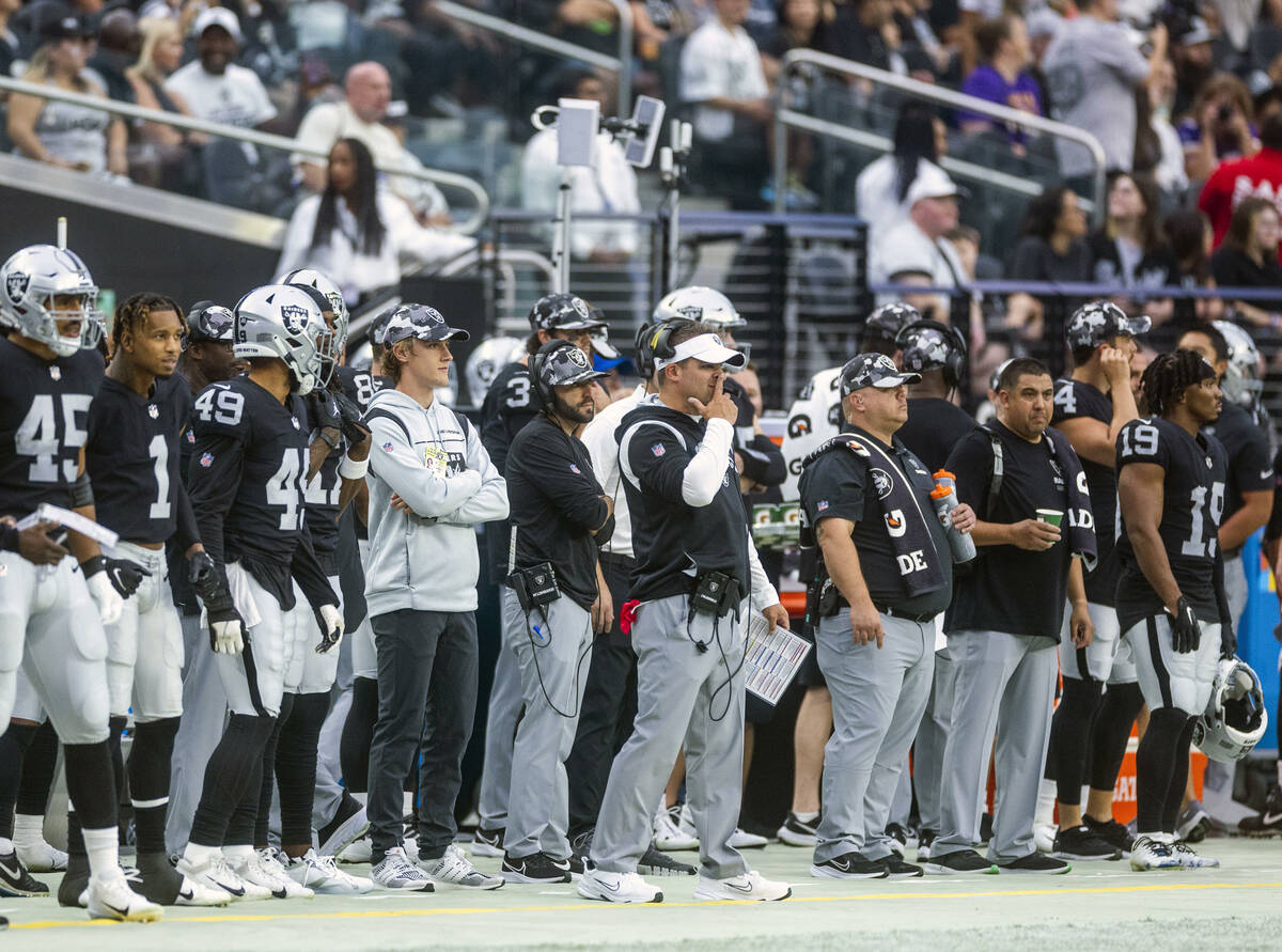 Raiders Head Coach Josh McDaniels considers a play on the sidelines during the first half of th ...