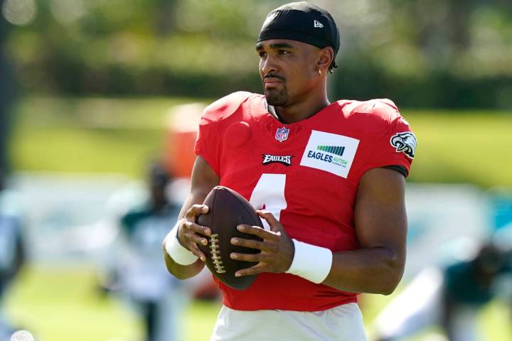 Philadelphia Eagles quarterback Jalen Hurts takes part in drills at the Miami Dolphins' NFL foo ...