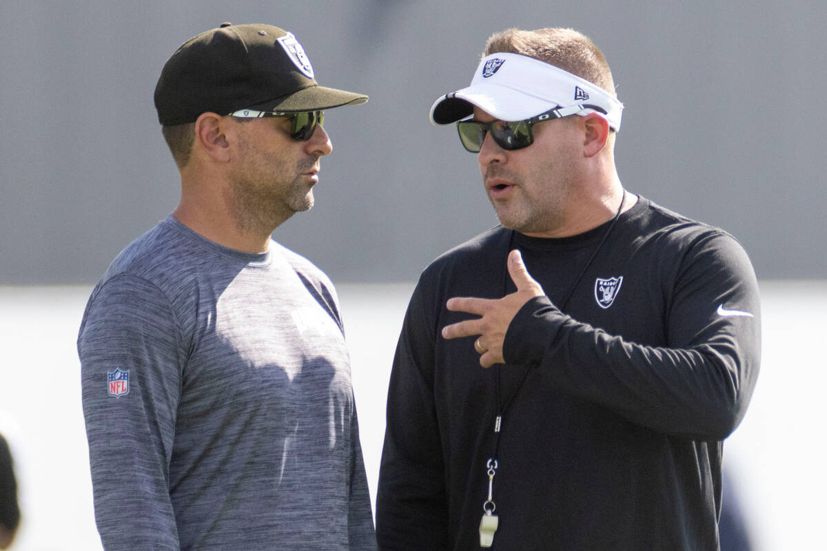 Raiders general manager Dave Ziegler, left, and head coach Josh McDaniels during the teamȁ ...