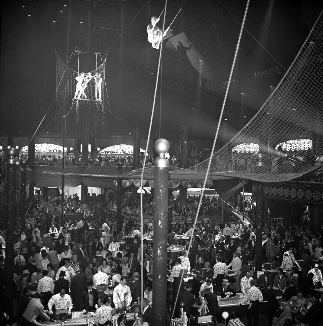 In the early days of Circus Circus, aerialists and other acts performed directly over the gamin ...