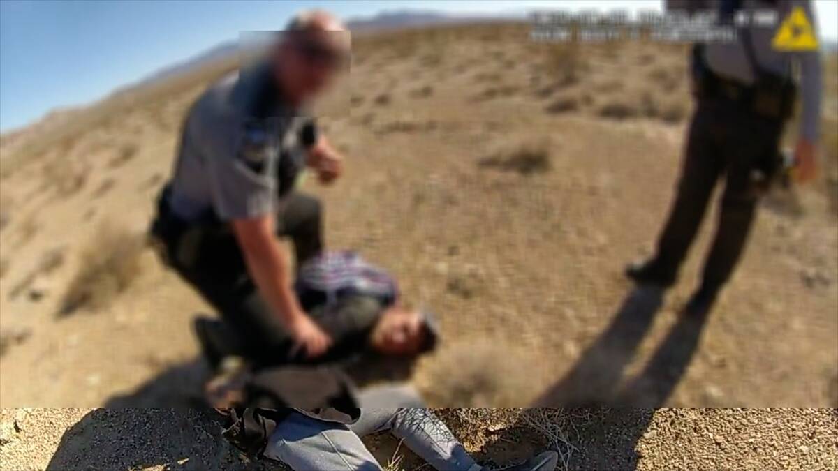 Conner Jack Oswalt, 17, is confronted by Nevada State Police on Interstate 15 near Goodsprings ...
