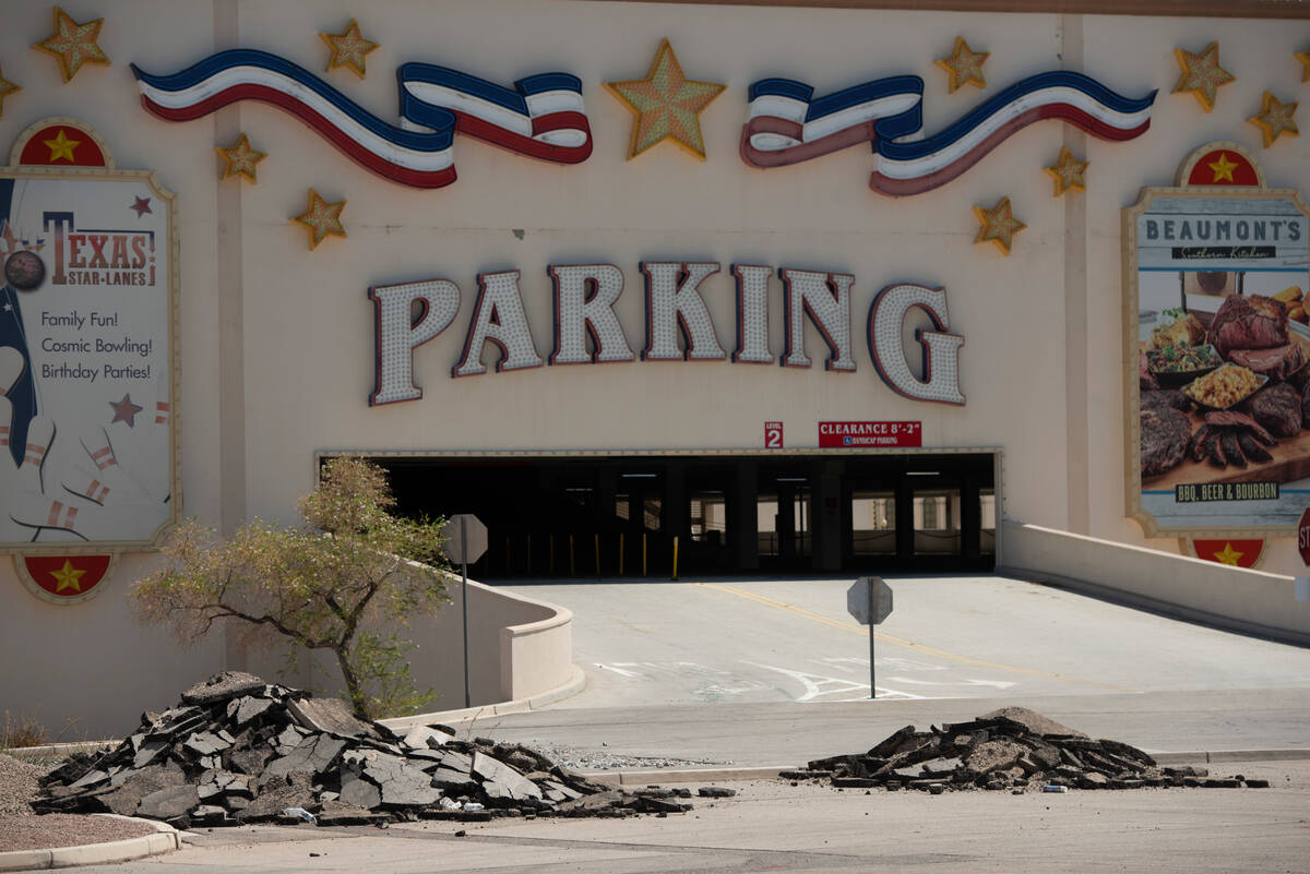 Piles of torn up asphalt in the parking lot of the Texas Station hotel-casino at Rancho Drive a ...