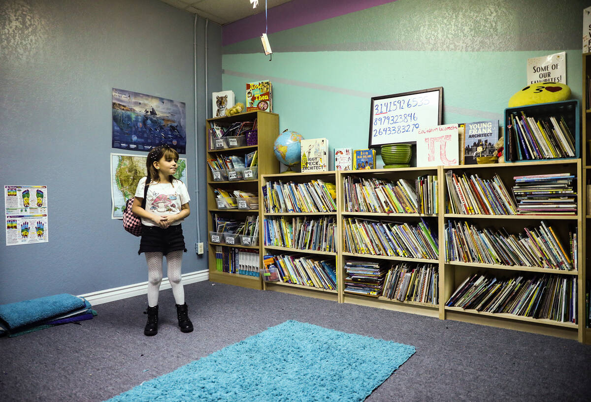 Elliotte Campbell, 10, leads a tour of Bloom Academy, a "self-directed learning center” that ...