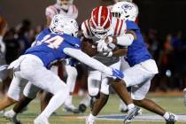 Mater Dei's wide receiver Jordan Onovughe (14) runs through Bishop Gorman defends during the se ...