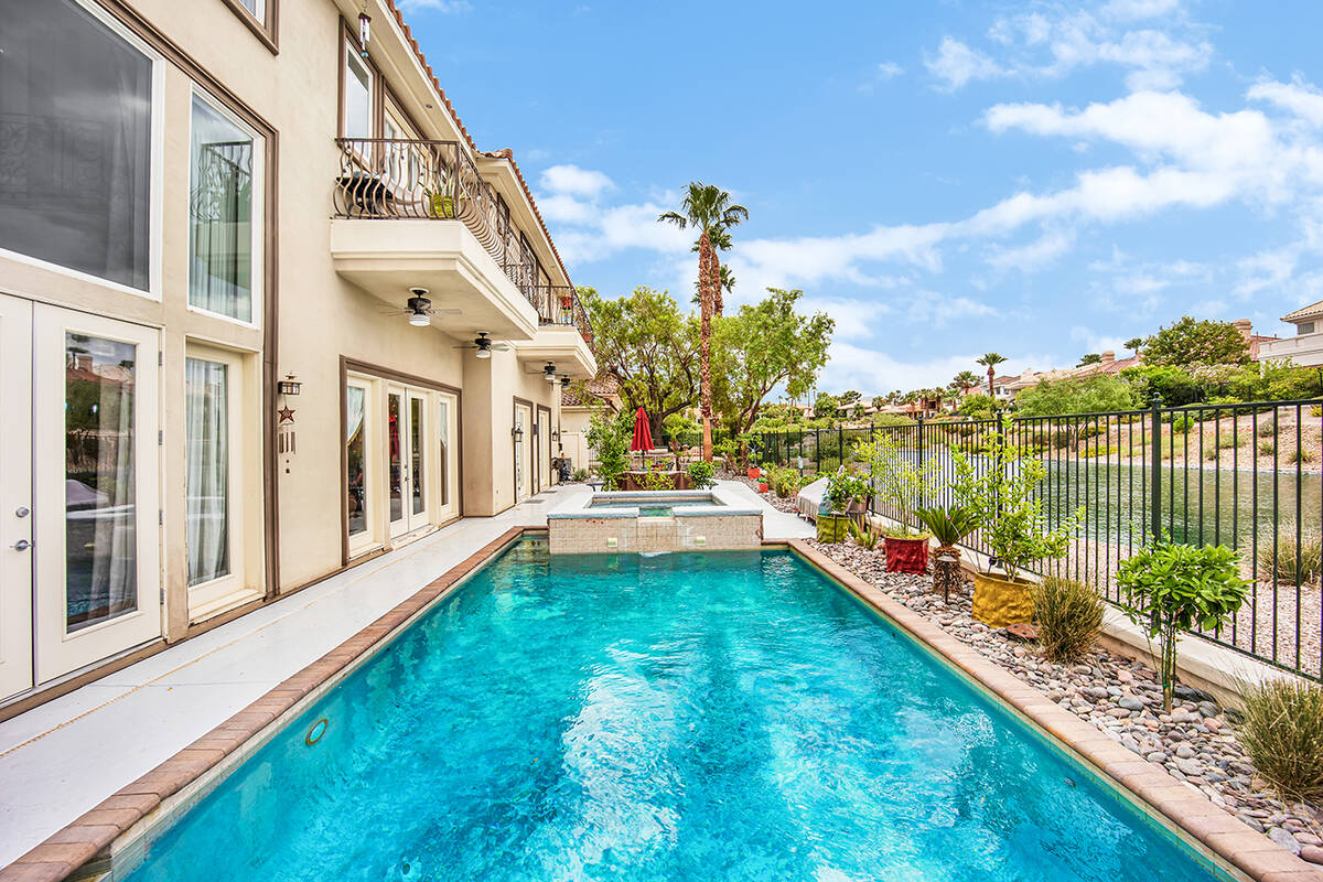 This 6,764-square-foot, six-bedroom, 6½ bathroom home, listed at $2,599,999, sits on a quarter ...