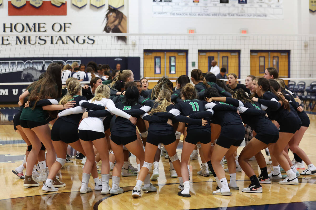Palo Verde players huddle before the start of a girl's volleyball game against Shadow Ridge at ...