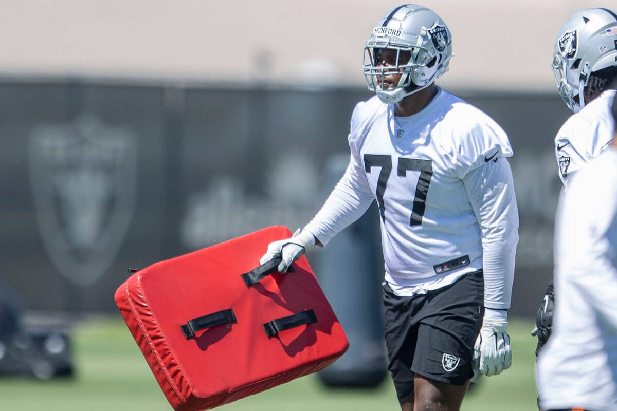 Raiders offensive tackle Thayer Munford (77) prepares to drill during the team’s mandato ...