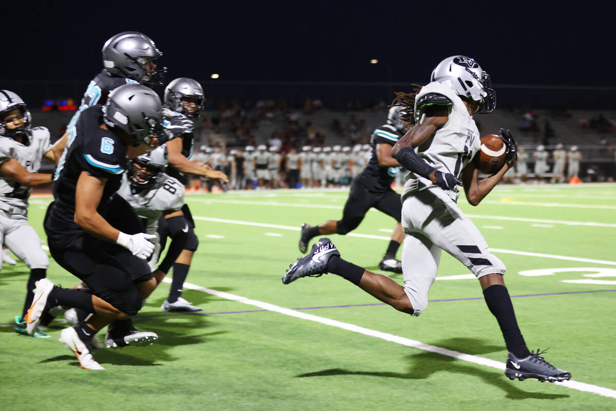 Palo Verde's Has Tucker (11) returns an onside kick for a touchdown against Silverado during th ...