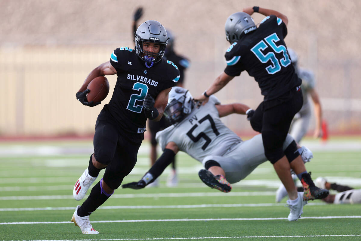 Silverado's Donavyn Pellot (2) runs the ball against Palo Verde during the first half of a foot ...