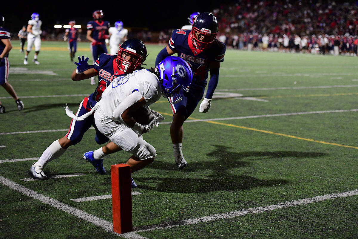 The Bishop Gorman Gaels battle the Saint Louis Crusaders played at John Kauinana Stadium on Fri ...
