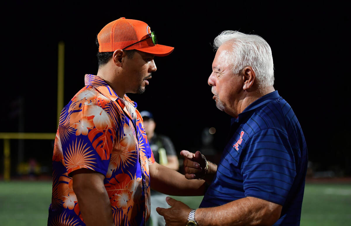 Bishop Gorman coach Brent Browner met with Saint Louis Crusaders coach Ron Lee after a game bet ...