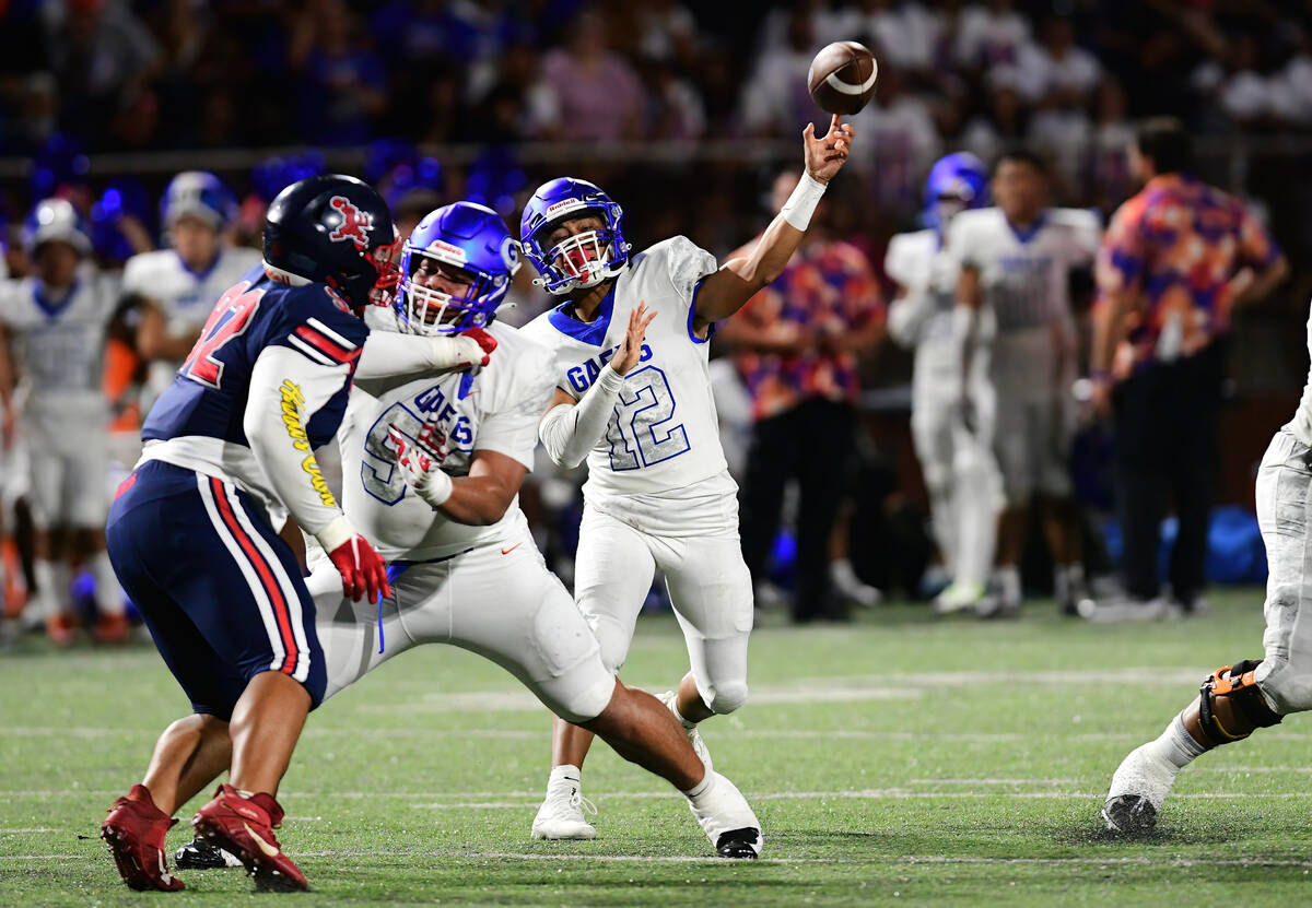 Bishop Gorman quarterback Micah Alejado (12) threw the ball during a game between the Bishop Go ...