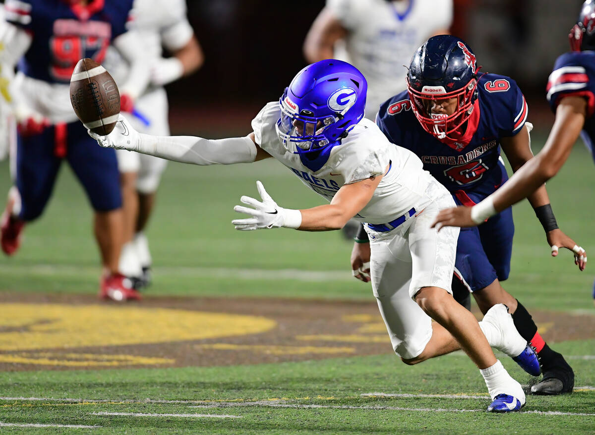 Bishop Gorman wide receiver Dylan Herman (7) fought for the ball during a game between the Bish ...