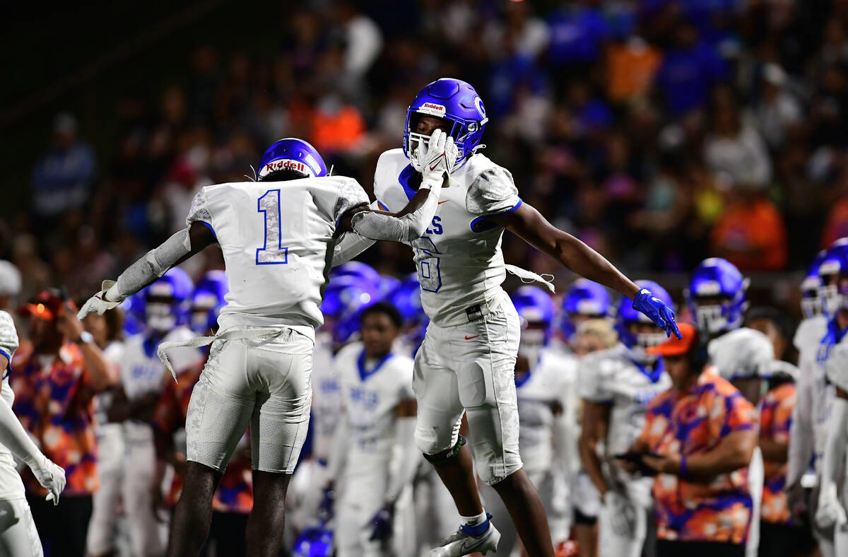 Bishop Gorman players celebrate during a game between the Bishop Gorman Gaels and the Saint Lou ...