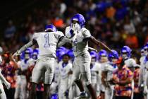 Bishop Gorman players celebrate during a game between the Bishop Gorman Gaels and the Saint Lou ...