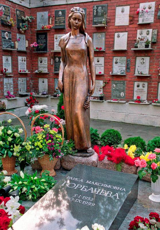 FILE - A monument to Raisa Gorbachev, wife former Soviet President Mikhail Gorbachev stands beh ...