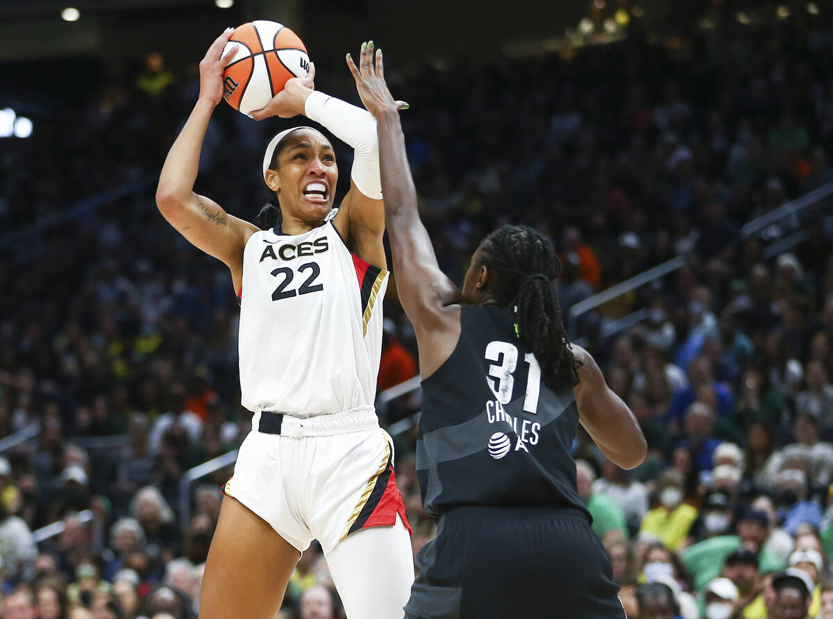 Las Vegas Aces forward A'ja Wilson (22) shoots over Seattle Storm center Tina Charles (31) duri ...