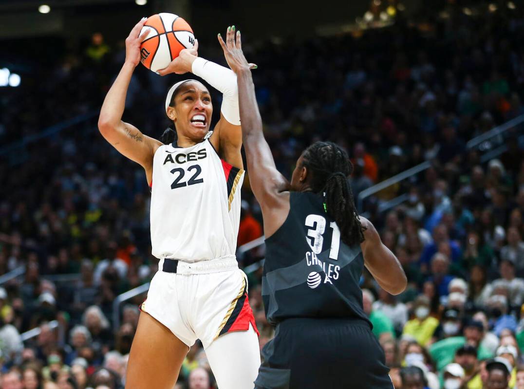 Las Vegas Aces forward A'ja Wilson (22) shoots over Seattle Storm center Tina Charles (31) duri ...