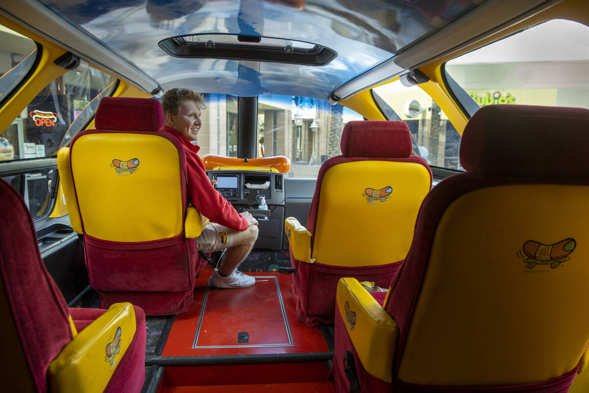Tommy Salami sits behind the wheel as part of a two-person crew with the Oscar Mayer Wienermobi ...
