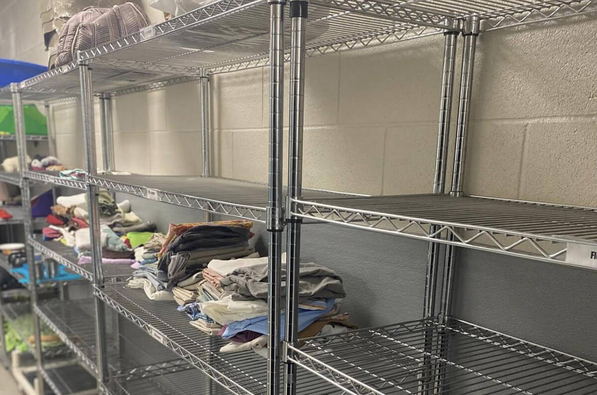 Nearly-empty storage shelving at The Animal Foundation in Las Vegas on Monday, Sept. 5, 2022. ( ...
