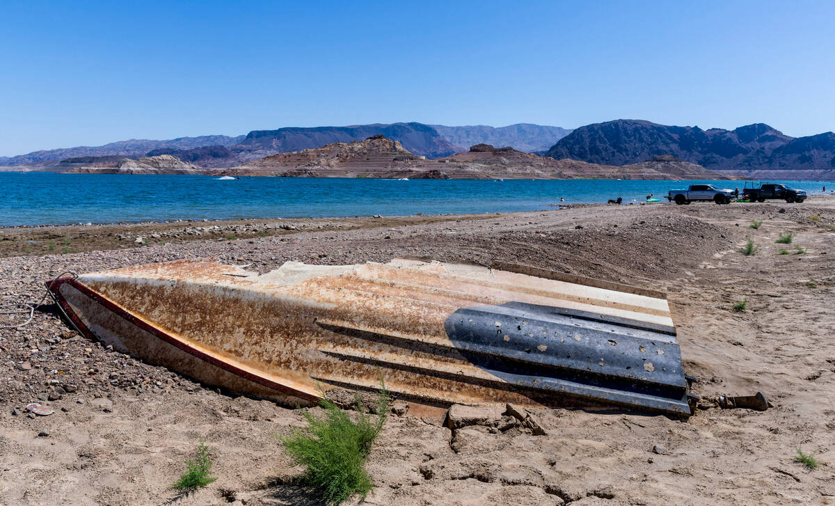An old boat is exposed along the shoreline near Boulder Beach on Labor Day within the Lake Mead ...