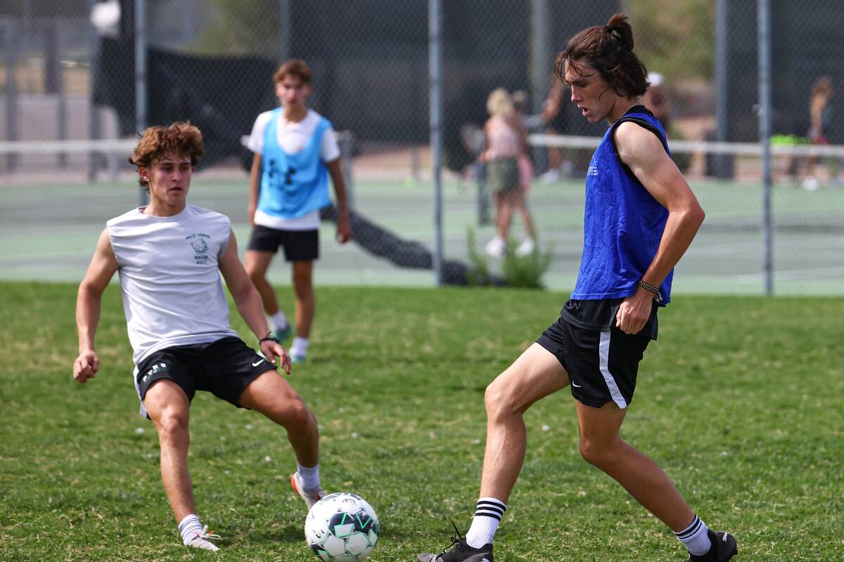 Palo Verde’s Quentin Gomez, right, tries to get the ball past Matthew Vogel during socce ...