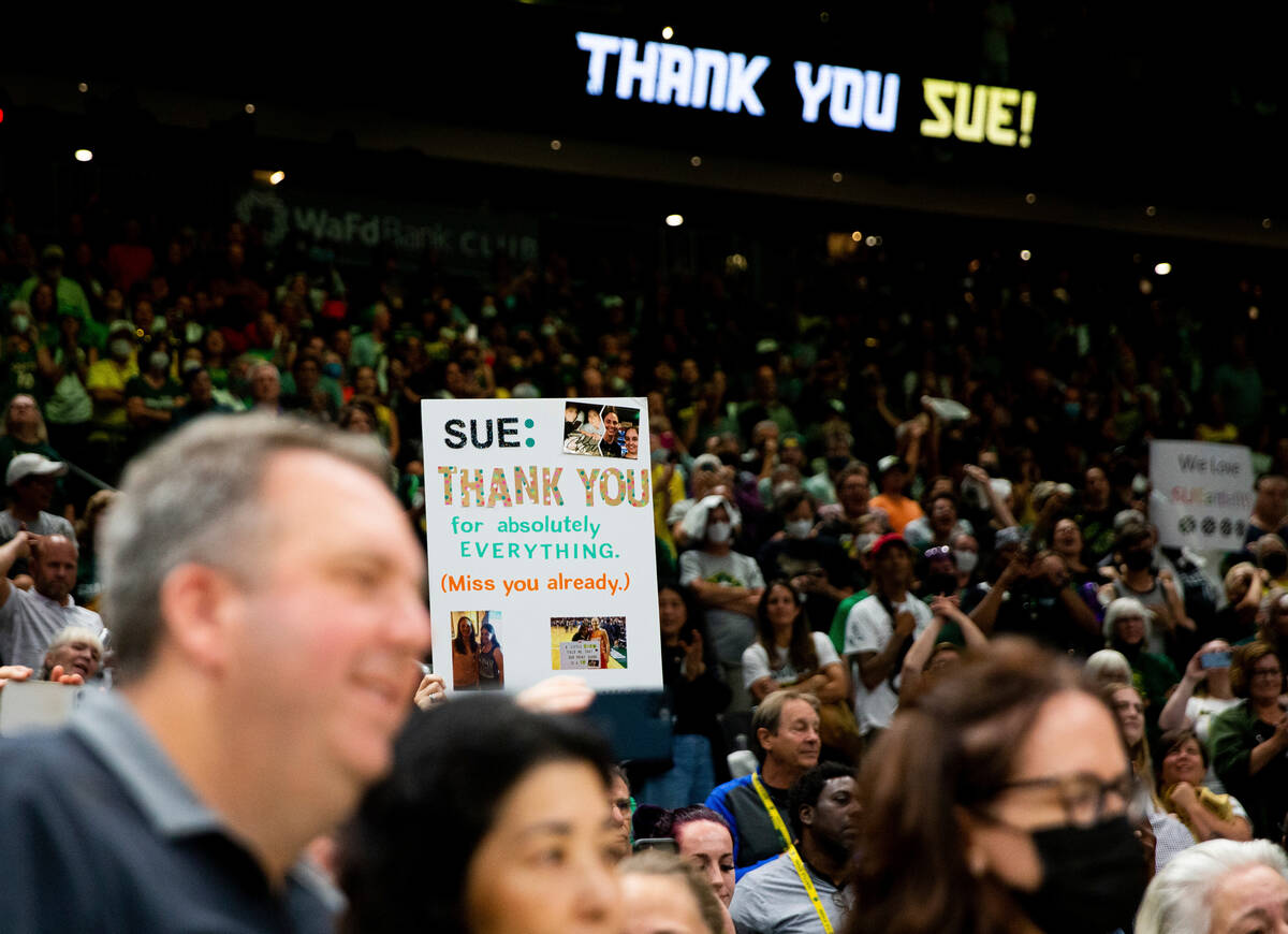 A fan holds a sign thanking Seattle Storm guard Sue Bird after the Storm lost to the Las Vegas ...