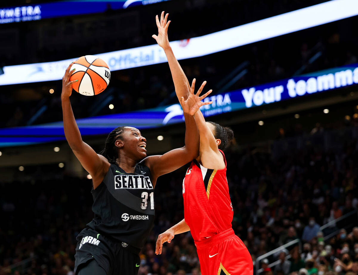 Seattle Storm center Tina Charles (31) goes up to the basket against Las Vegas Aces center Kiah ...