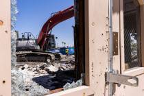 Demolition crews tear down Zion Methodist Church, the burnt sanctuary, on Tuesday, Sept 6, 2022 ...