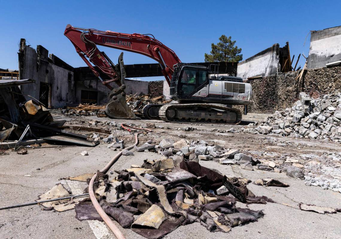 Demolition crews tear down Zion Methodist Church, the burnt sanctuary, on Tuesday, Sept 6, 2022 ...